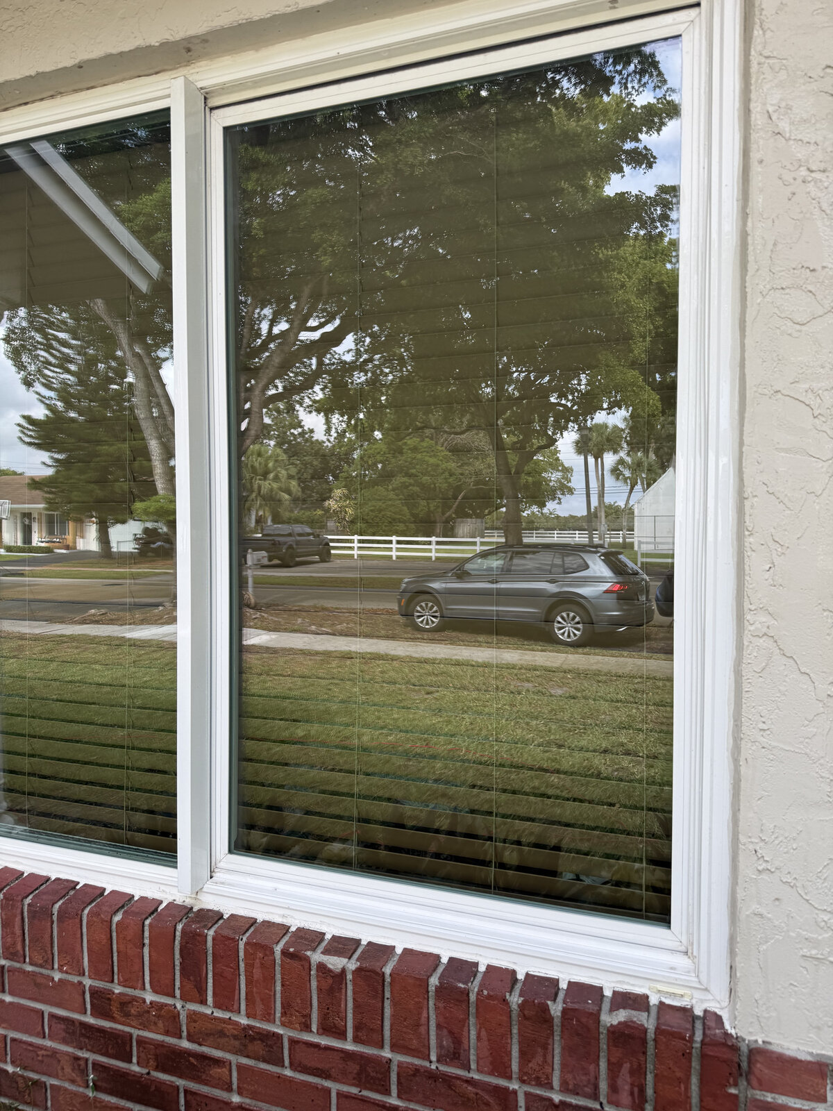 Crystal clear front window after professional cleaning
